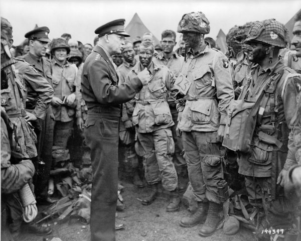 General Dwight D. Eisenhower tells paratroopers "Full victory--nothing else" at Greenham Common, England, on June 5, the eve of the invasion.